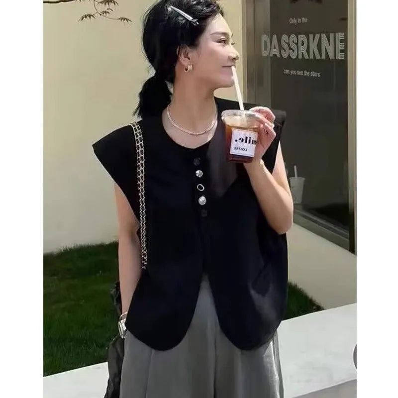 Women's loose fit polyester sleeveless vest in milky white with a visible pocket detail.