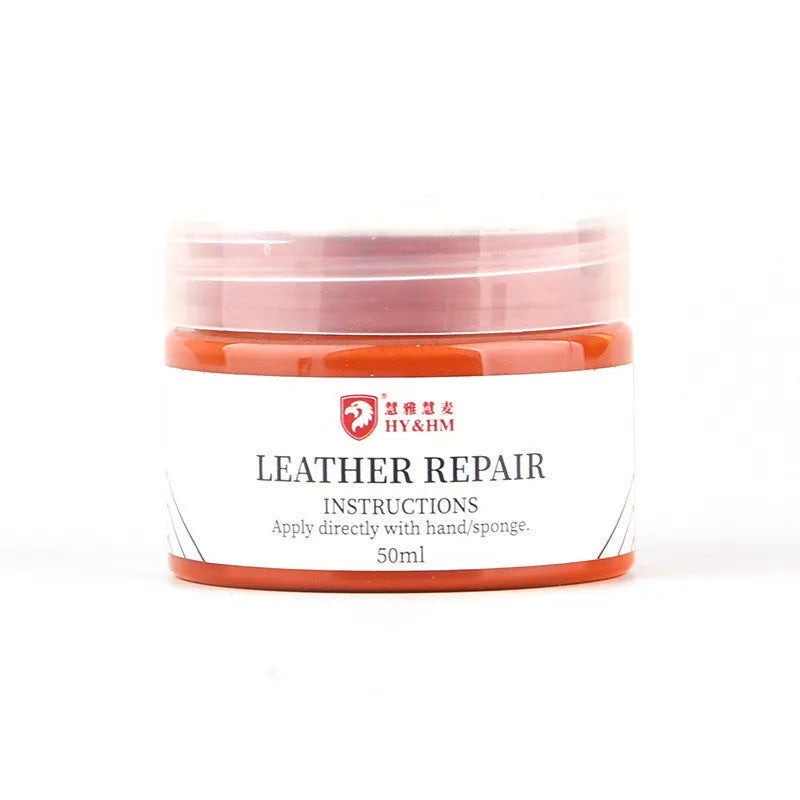 Leather repair cream in a round tin, available in multiple colours including black, blue, and red