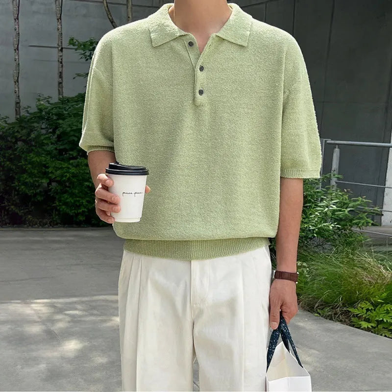 Men's caramel coloured loose fit knitted polo shirt with short sleeves and an asymmetrical design detail.