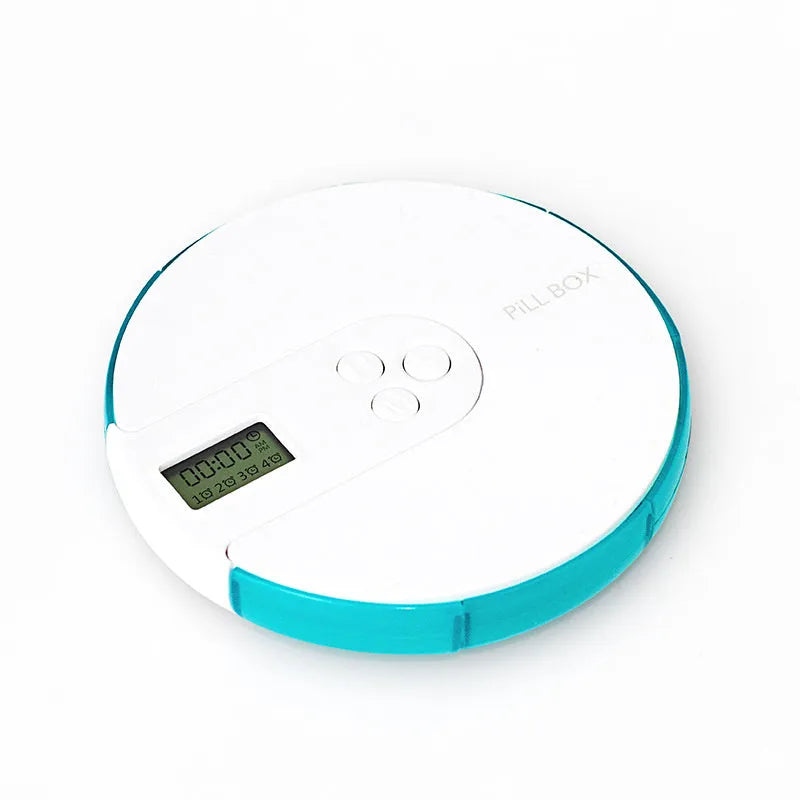Blue 7-compartment alarm clock pill dispenser showing time display and open compartments.