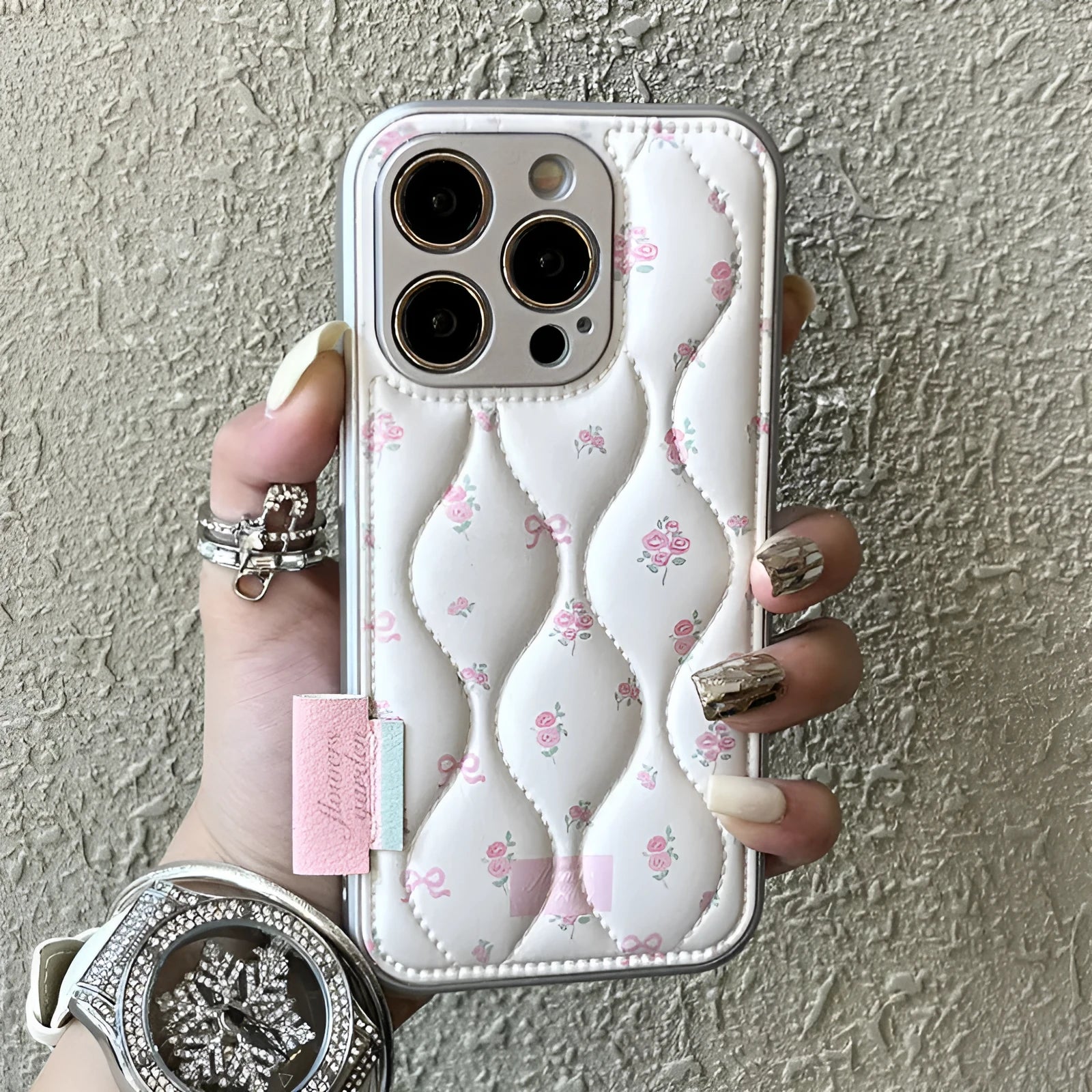 Creative down jacket small floral embossed leather phone case for iPhone with white background pattern