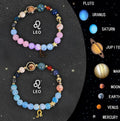 Set of two natural stone beaded bracelets showing zodiac sign charms for astrology.