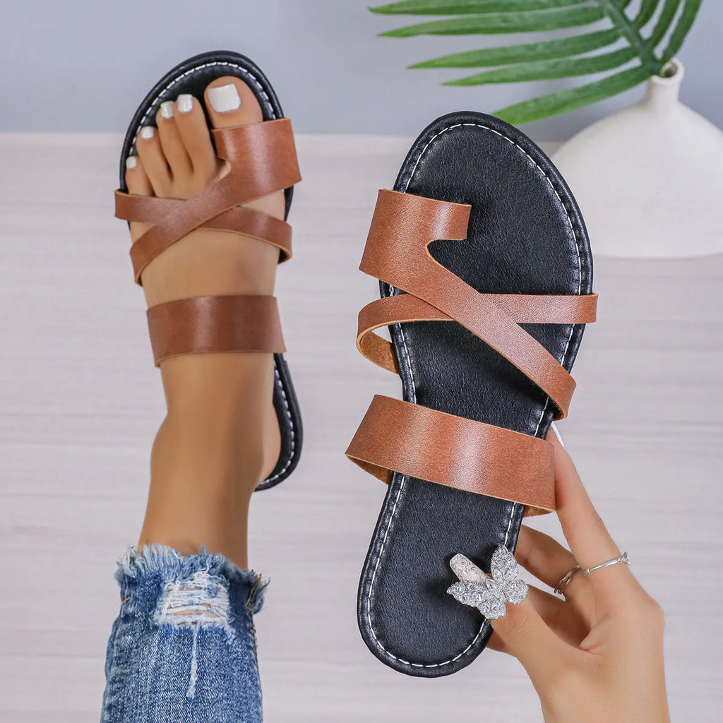 One-line casual beach slippers with hollow out design in artificial PU, showing black, brown and wine red colour options