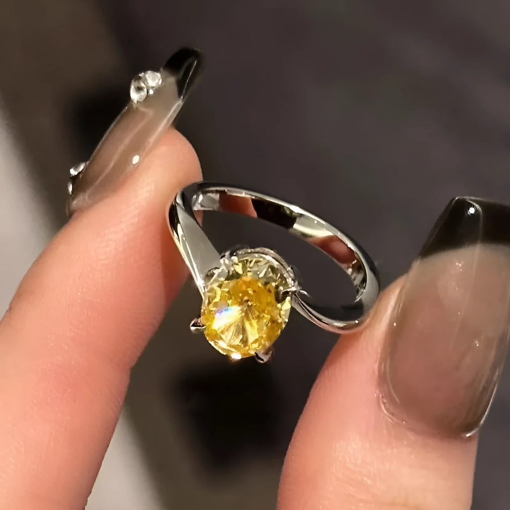 Women's yellow rock sugar crystal ring on copper band showing detail of crystal design