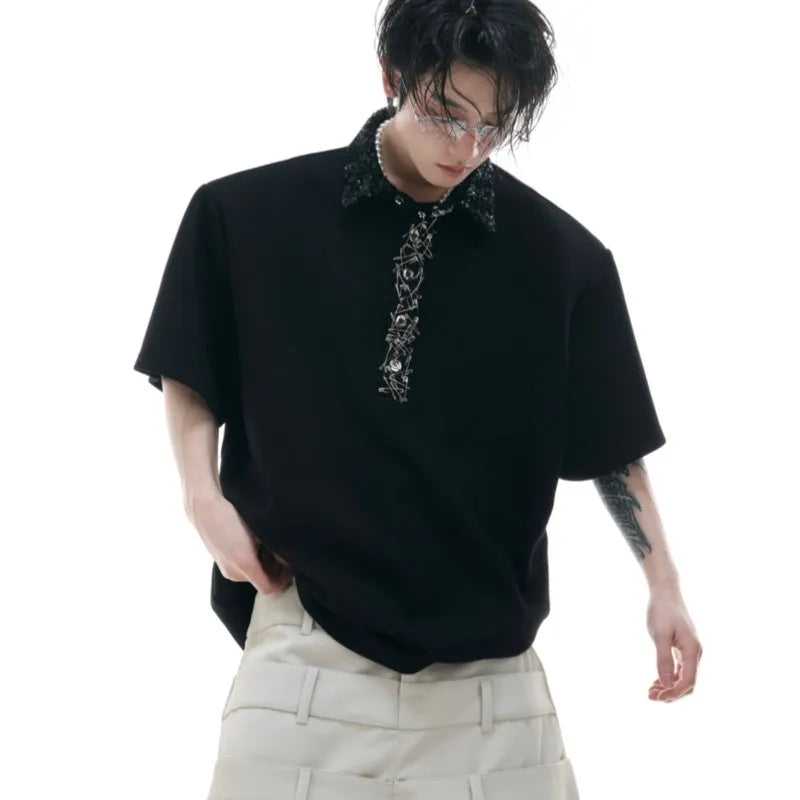 Men's black loose fit polo t-shirt with embroidered sequins and a square collar.