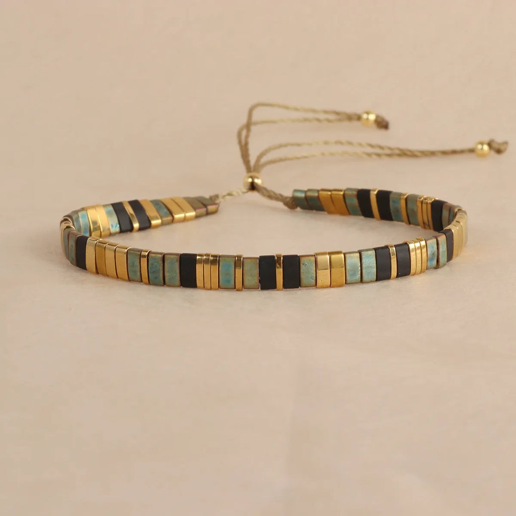 Geometric pull bead bracelet with round glass beads in five colour options