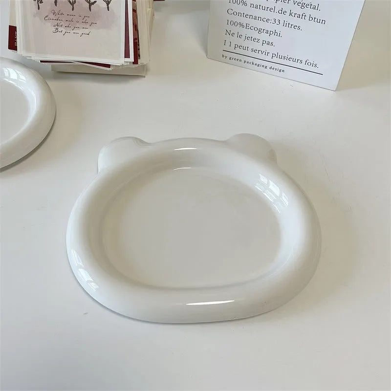 White porcelain plate with bear doodle design, round shape, shown in 15cm and 20cm sizes
