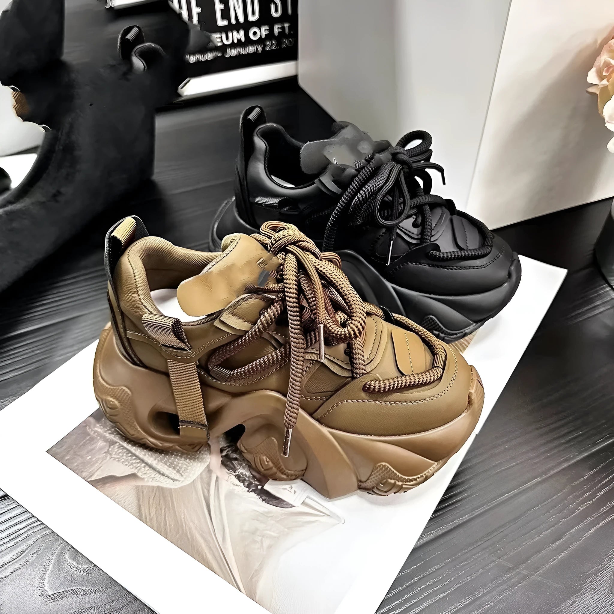 Women's creamy white casual wedge sneakers with a thick platform sole and front lace-up closure.