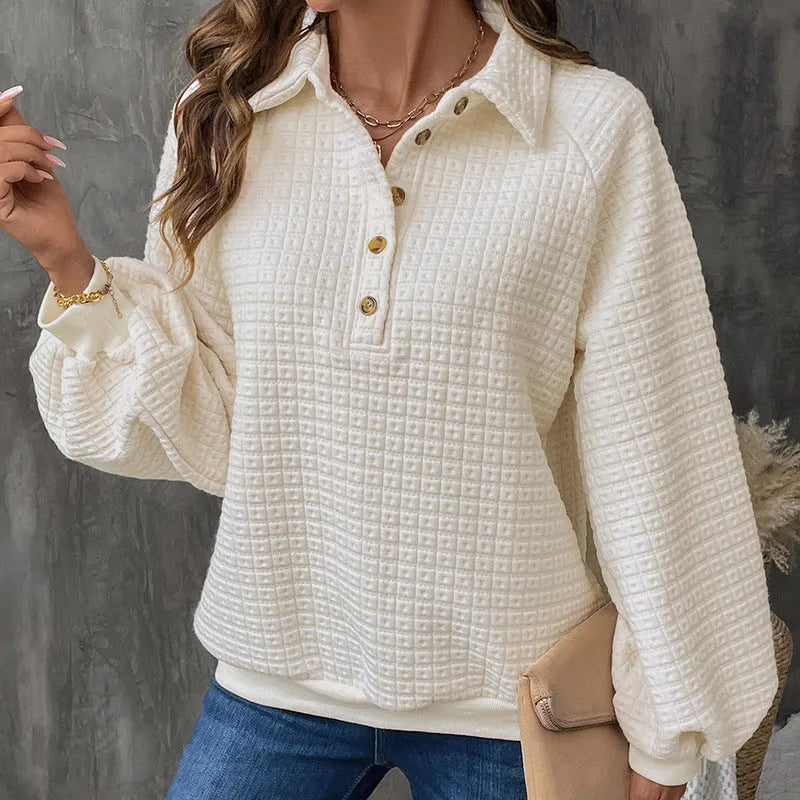 Women's milky white textured polo collar sweater on a hanger.