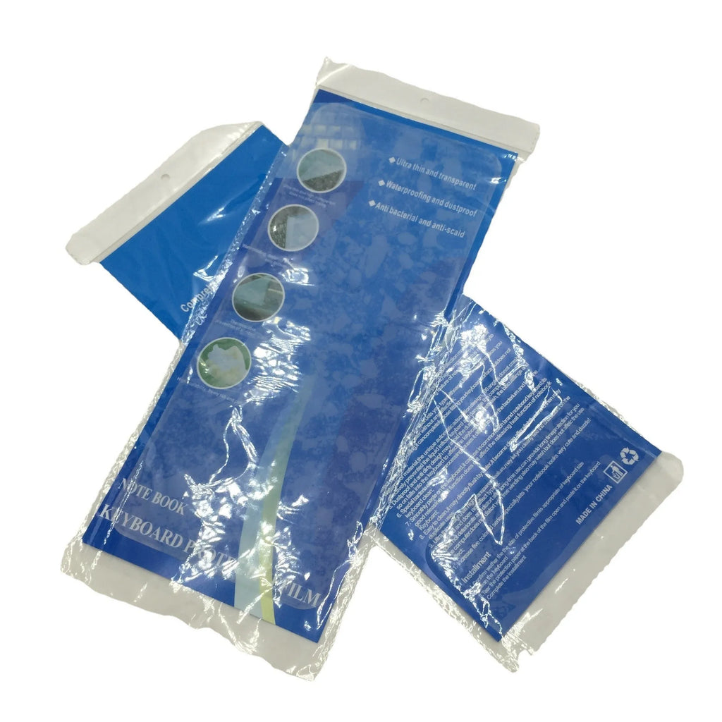 Transparent silicone keyboard dust film for laptop, showing close fit over keys