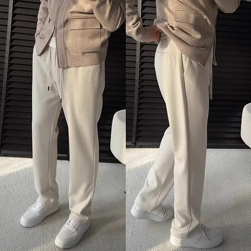 Loose men's cotton-blend sweatpants in solid colour with wide leg and drawstring waist