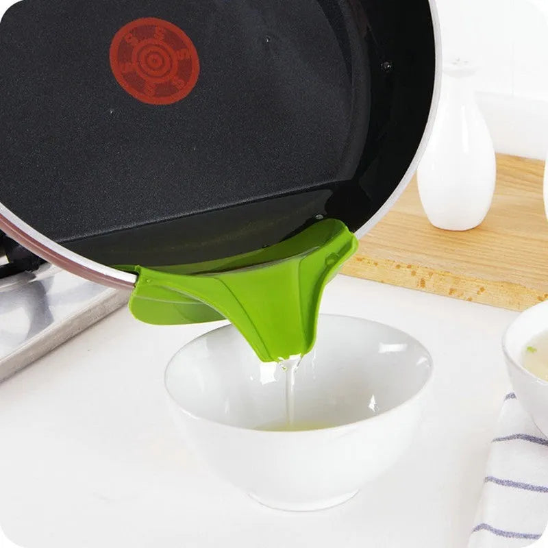 Green silicone kitchen funnel tool for circular pots with clamp design to prevent spills