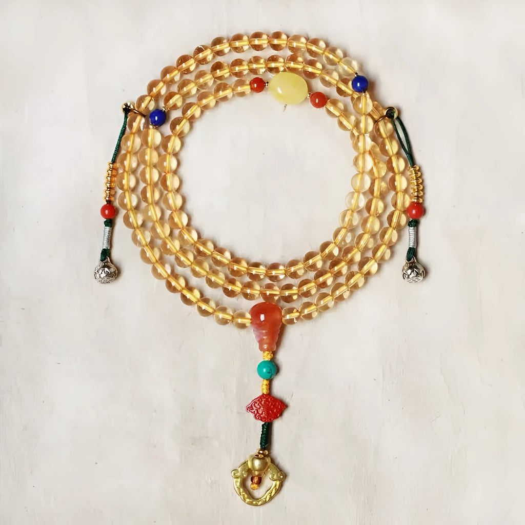 Yellow natural citrine beaded bracelet with 1mm beads on a filament strand.