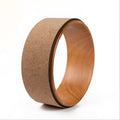 Back bending weight-bearing high yoga wooden yoga ring with cork surface on fitness mat