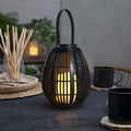 Solar retro rattan garden light with oval design for patio decoration