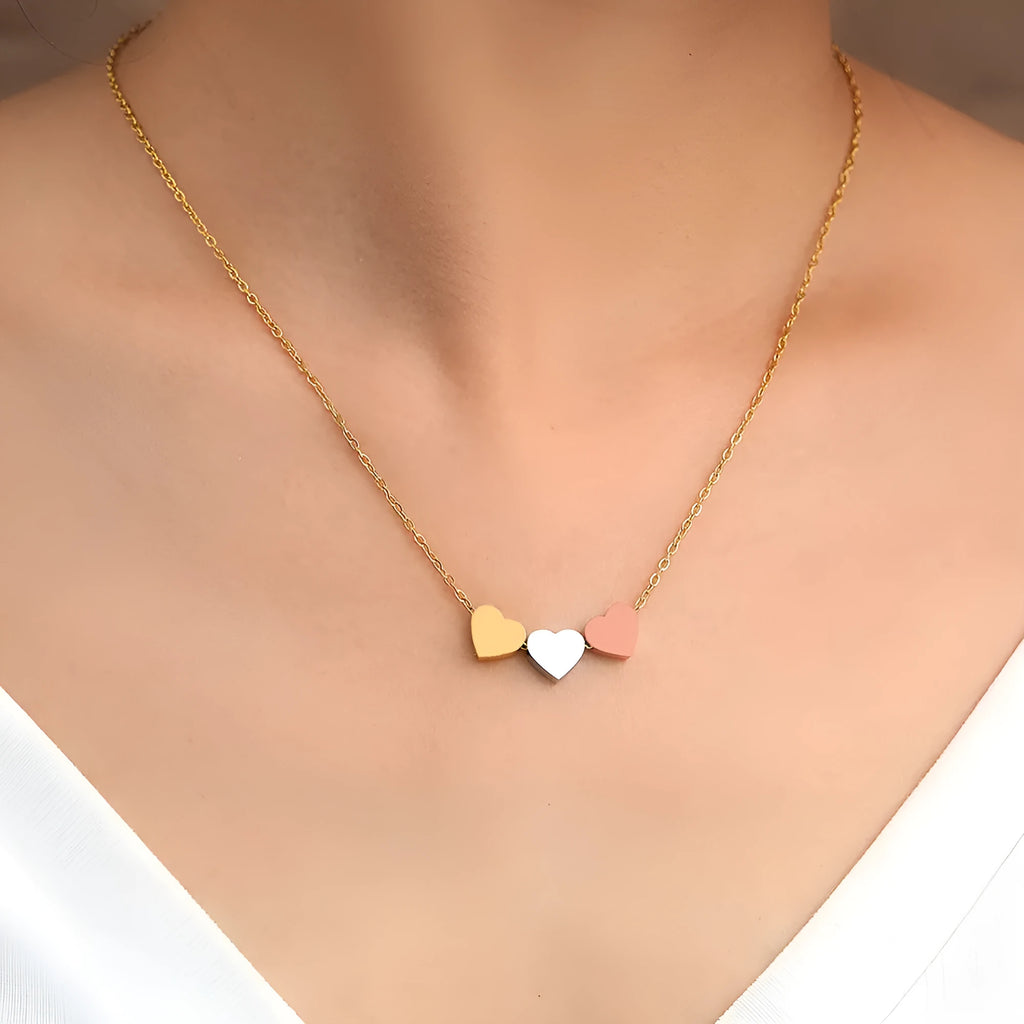Mirror finish titanium steel heart pendant necklace in gold, rose gold, and steel colour options