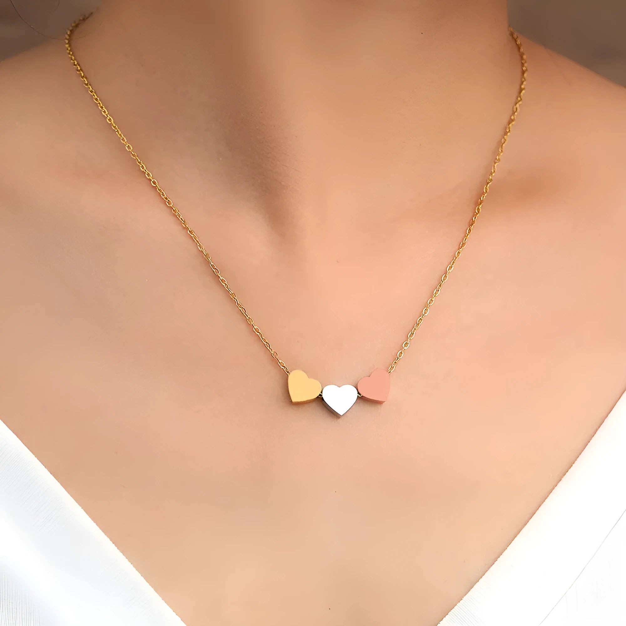 Mirror finish titanium steel heart pendant necklace in gold, rose gold, and steel colour options