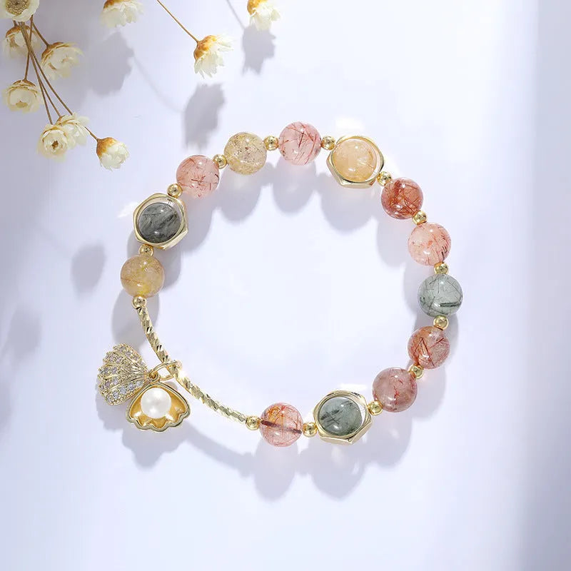Women's crystal bracelet with coloured hair crystal and red sealant flower shell design