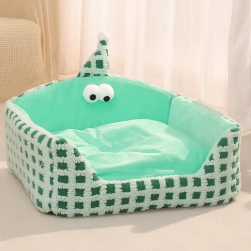 Triangular hat-shaped pet sleeping nest with removable sponge insert in green, purple, and yellow colours