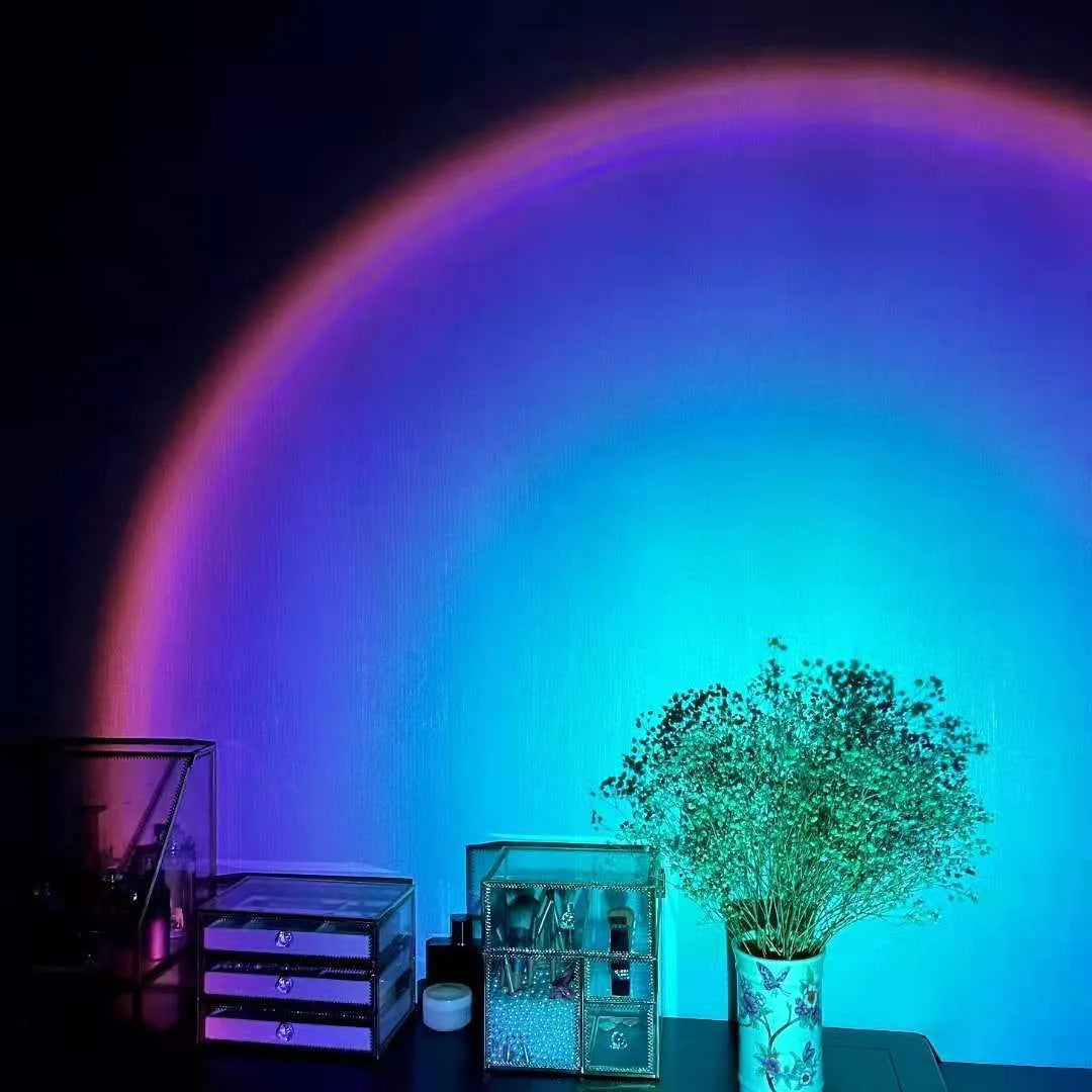 Rechargeable rainbow sunset projection lamp with USB connector showing sunset red colour projection