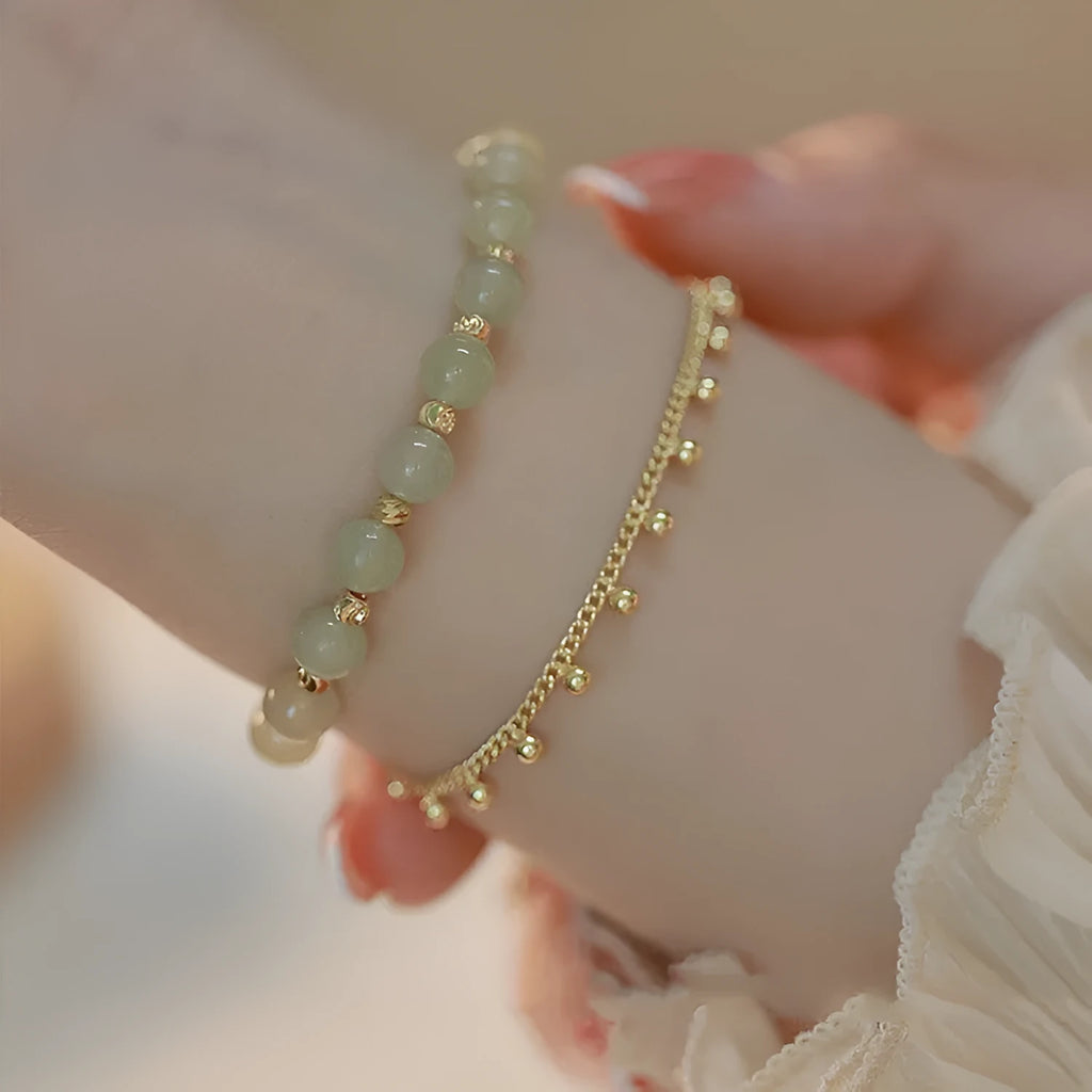 Natural Hetian jade beaded bracelet in classic princess running style for women.