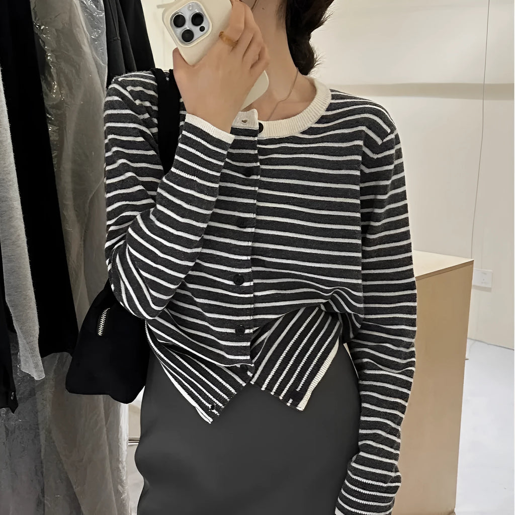 Dark grey and white striped women's slim-fit cardigan coat with long sleeves, shown on a model.