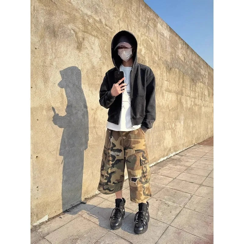 Men's camouflage cotton cropped jeans with distressed patches and straight leg