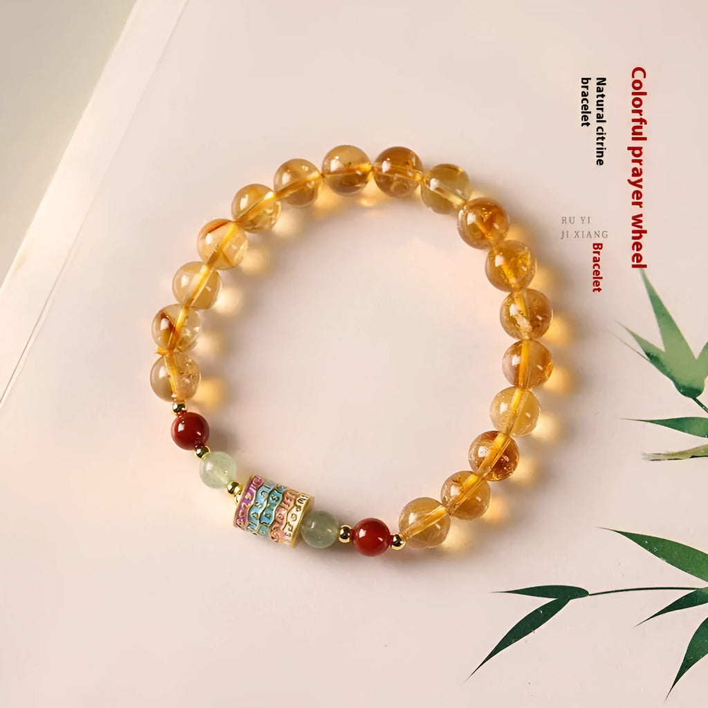 Yellow citrine bracelet with prayer wheel centrepiece and 8mm round beads
