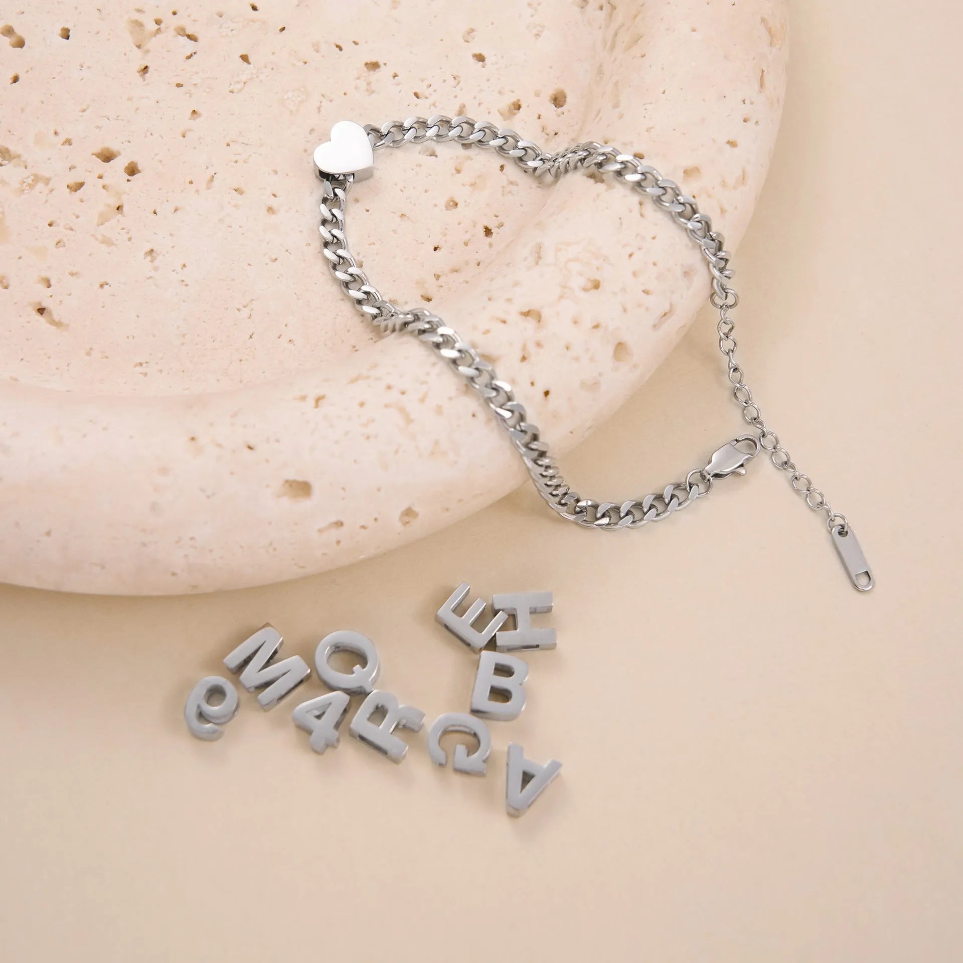 Gold electroplated titanium steel necklace showing letter A pendant on a 40.5cm blade chain
