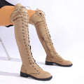 Black lace-up over the knee boots with round toe, flat heel, and decorative stitching.