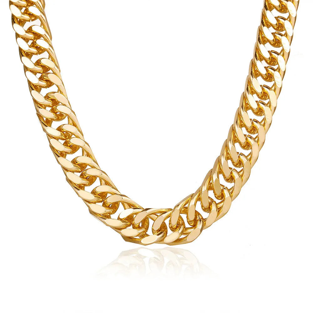 Gold-coloured thick chain necklace for women on a plain background