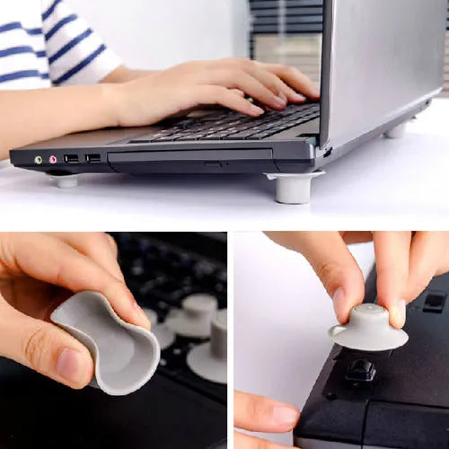 Grey durable plastic laptop cooling stand with two large and two small non-slip pads.