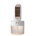 Small black and white oscillating humidifier fan with mechanical controls on desktop