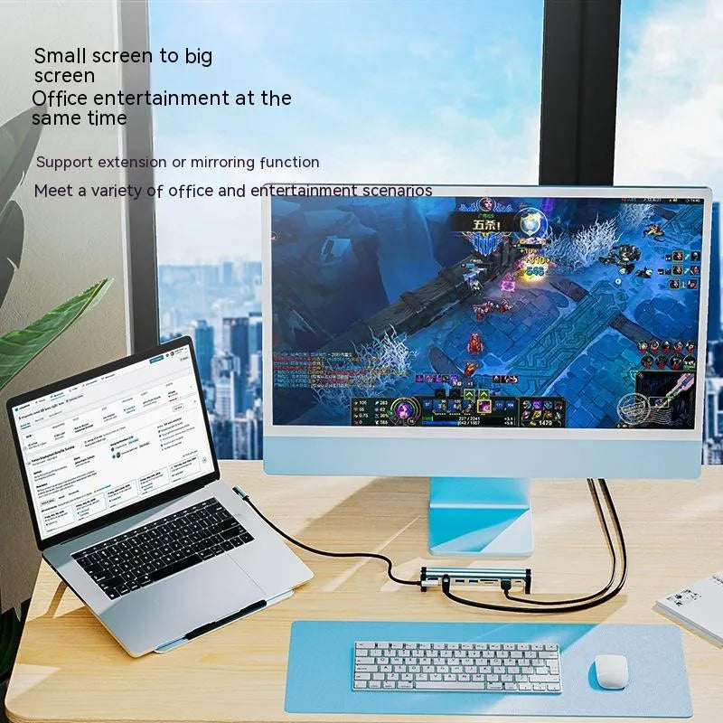 Aluminium alloy notebook docking station with multiple USB 3.0 ports and cable on desk