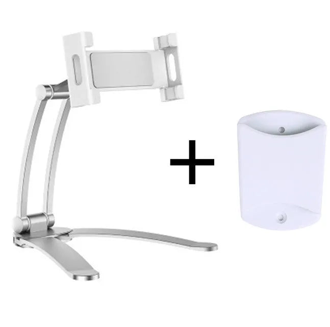 Silver aluminium alloy desktop stand holding a tablet at an angle, with adjustable clips and a white mounting base.