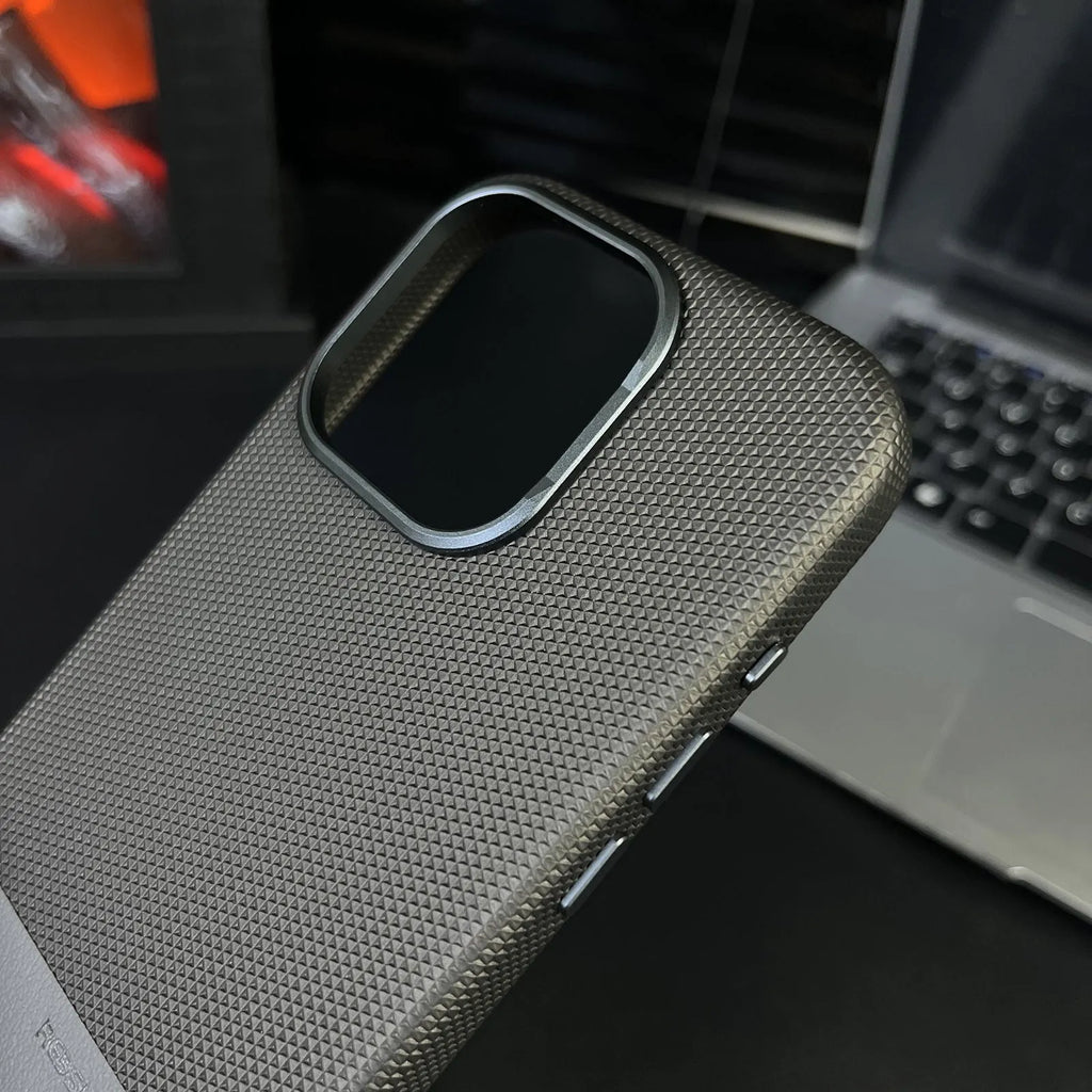 Black iPhone case with dragon scale texture and stitching, showing magnetic all-inclusive shockproof design