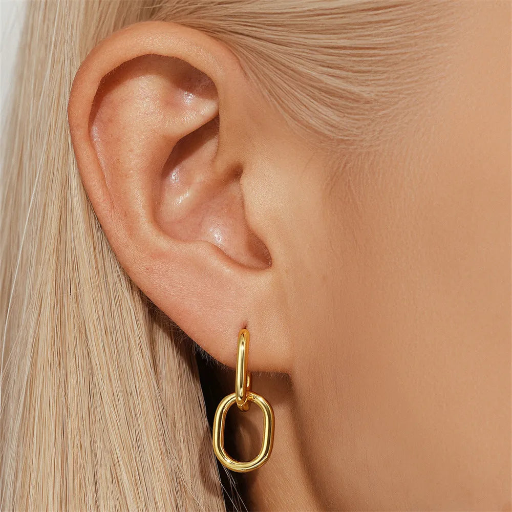 Brass diamond earclip earrings with geometric round design and gold electroplated finish