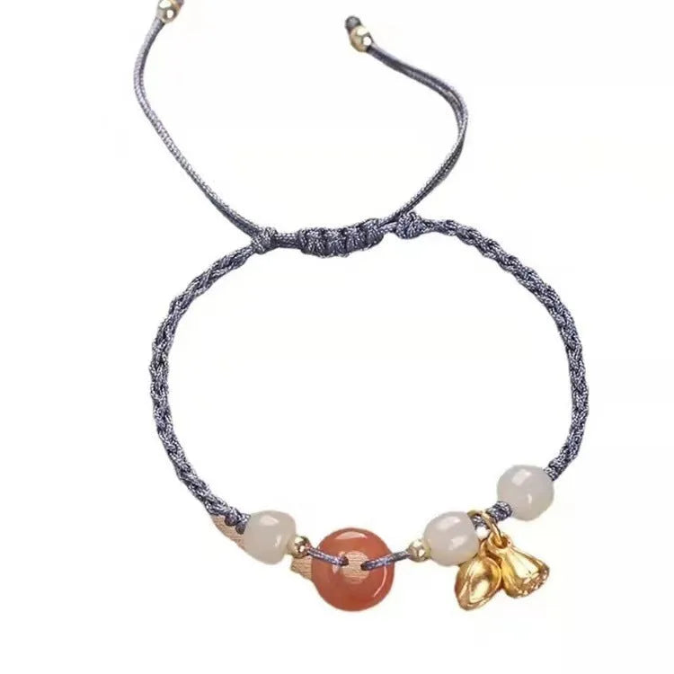 Hetian Jade constellation bracelet with two buckle closures on an adjustable strap.