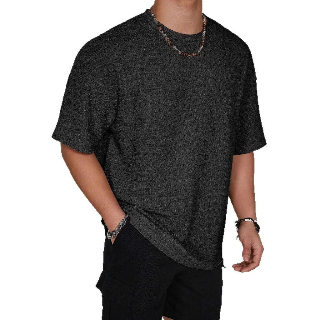 Men's slim fit loose hollow T-shirt in solid colour on a hanger