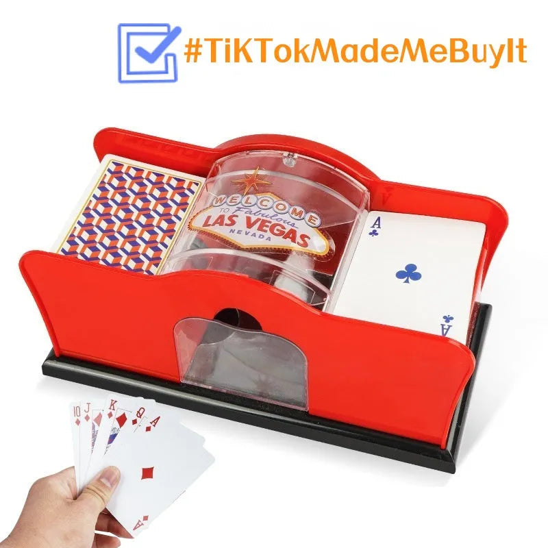 Black and red manual hand-crank card shuffler machine for casino games on a table.
