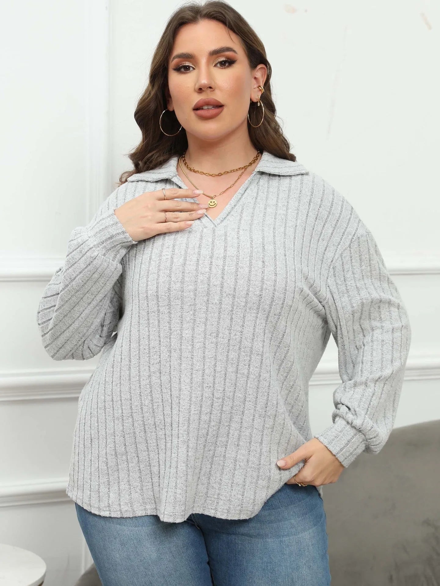 Women's plus size gray fleece pullover with polo collar and lantern sleeves
