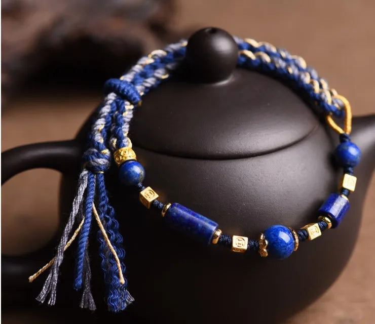 Hand woven ethnic bracelet with lapis lazuli colour and rope design on flexible wire
