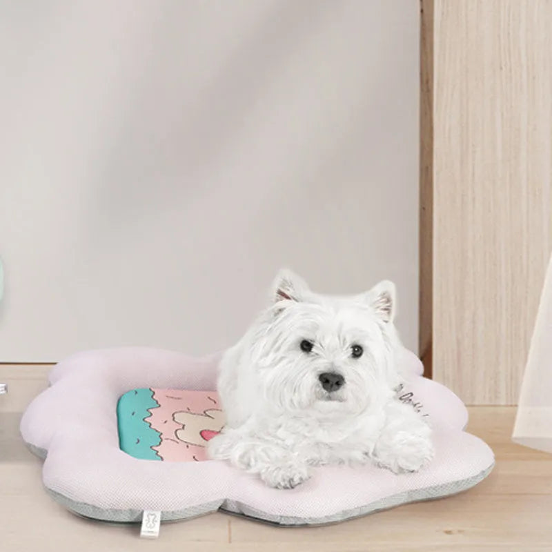 Ice silk pet cooling mat in green or pink colour, shown in four different sizes for small to large pets