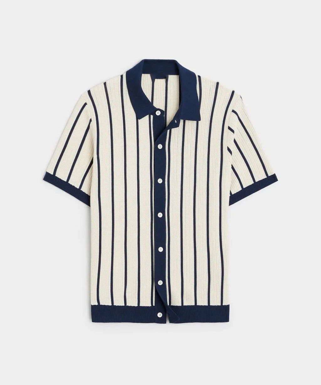 Men's white short sleeve knitted top with lapel collar and asymmetric design.