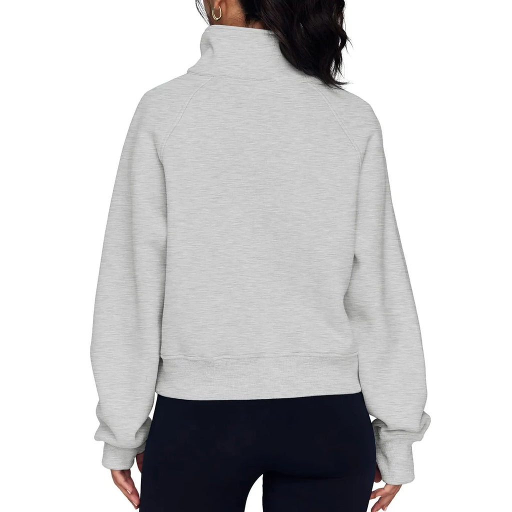 Women's loose lapel fleece-lined sweater in a solid colour showing raglan sleeve design