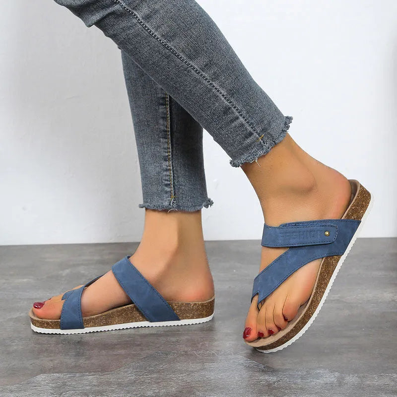 Flat toe ring thick-soled flip-flops in a solid colour with artificial PU upper and foam sole.