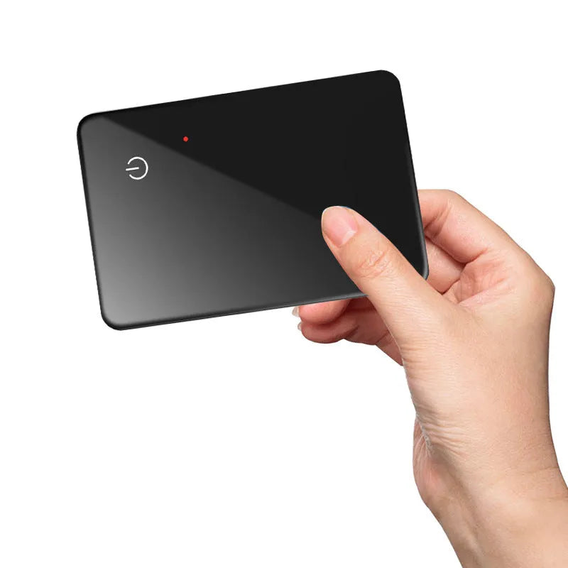 Black card-shaped pet tracking device with wireless charging and NFC capabilities
