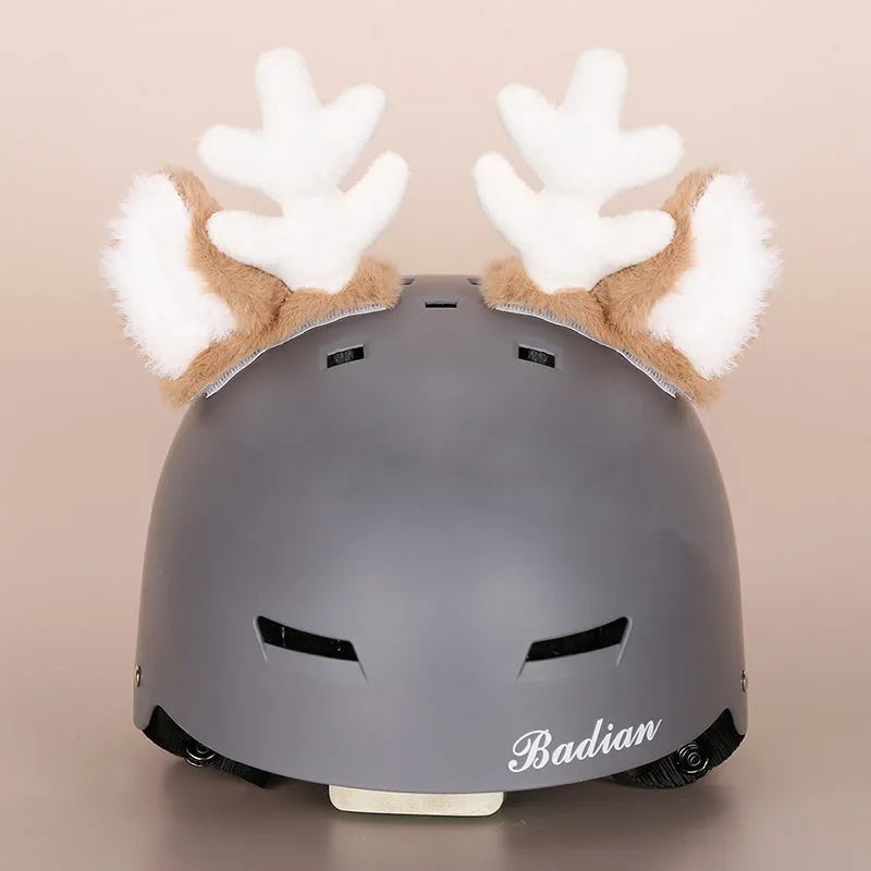 Soft plush cartoon character cover on a motorcycle helmet, showing size M and decorative ear sections.