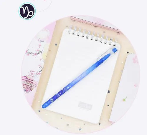 Box containing twelve constellation themed quick-drying gel pens for office use