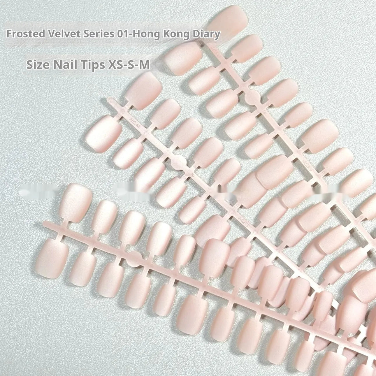 Frosted Velvet Cat's Eye press-on nails with Aurora iridescent shine, shown in short ladder sizes.